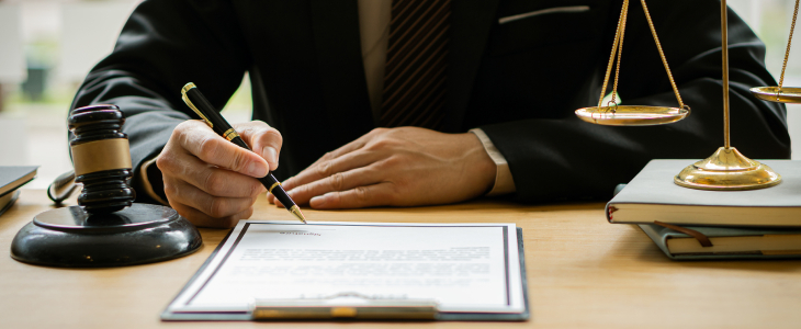 Lawyer filling out a document