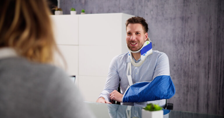 Injured worker speaking with lawyer